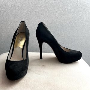 Michael Kors platform pumps.